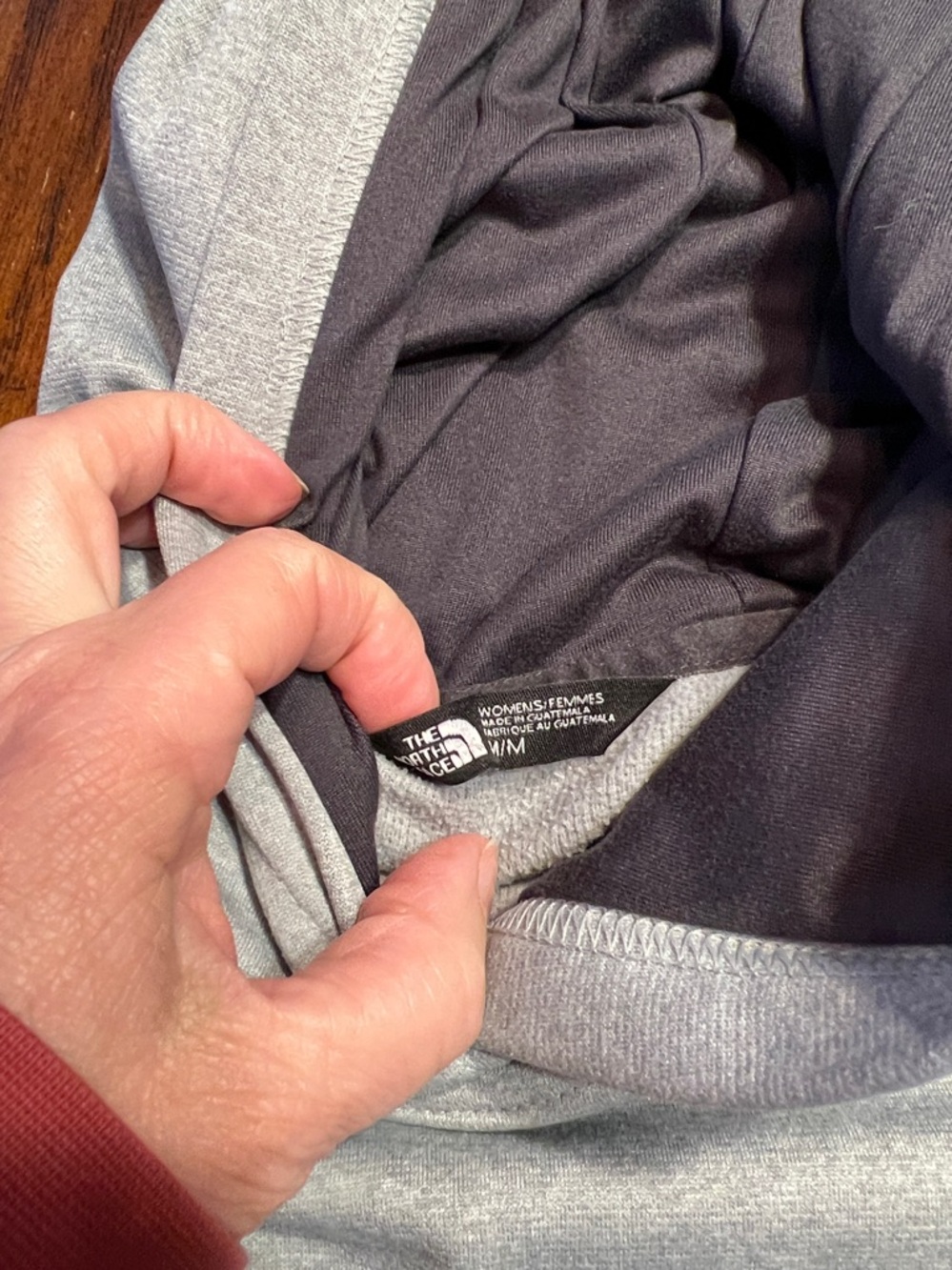 The North Face Light Gray Hoodie with Black, Blue & White Logo - Picture 3 of 3